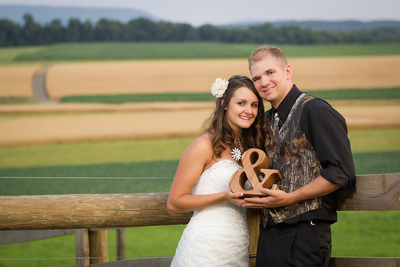 Brooke and Aaron, newlywed couple looking happy
